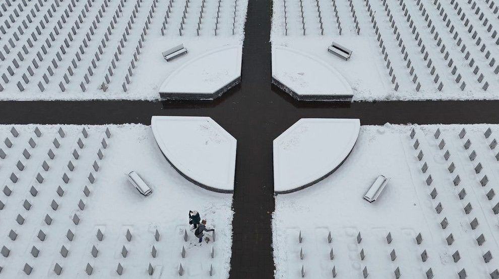 Nov 10, 2025 -- June Mitton (87) and her daughter Kelly visit their husband and father Kenneth Mitton a day before Remembrance Day during a cold snowy day at The National Military Cemetery at Beechwood Monday. Kenneth served with the Royal Canadian Air Force.