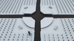 Nov 10, 2025 -- June Mitton (87) and her daughter Kelly visit their husband and father Kenneth Mitton a day before Remembrance Day during a cold snowy day at The National Military Cemetery at Beechwood Monday. Kenneth served with the Royal Canadian Air Force.