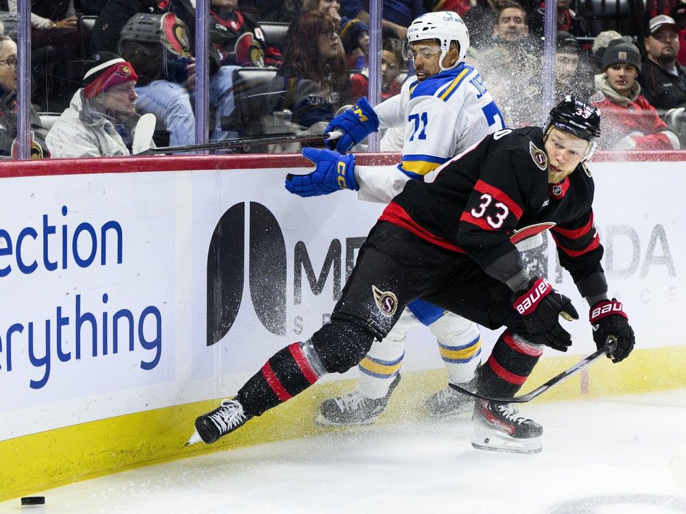  the ottawa senators’ nikolas matinpalo ties up the st. louis blues’ mathieu joseph as they vie for the puck during the first period in ottawa on saturday, dec. 6, 2025.