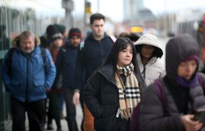 Commuters come and go from the Tunney's Pasture LRT station. Photo by JULIE OLIVER/Postmedia
