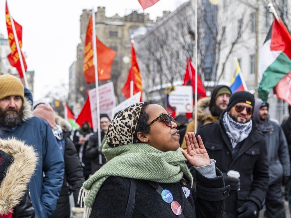  Protesters gathered and marched outside the U.S. Embassy in Ottawa on Sunday, Jan. 4, 2026, citing opposition to a reported U.S. incursion into Venezuela.