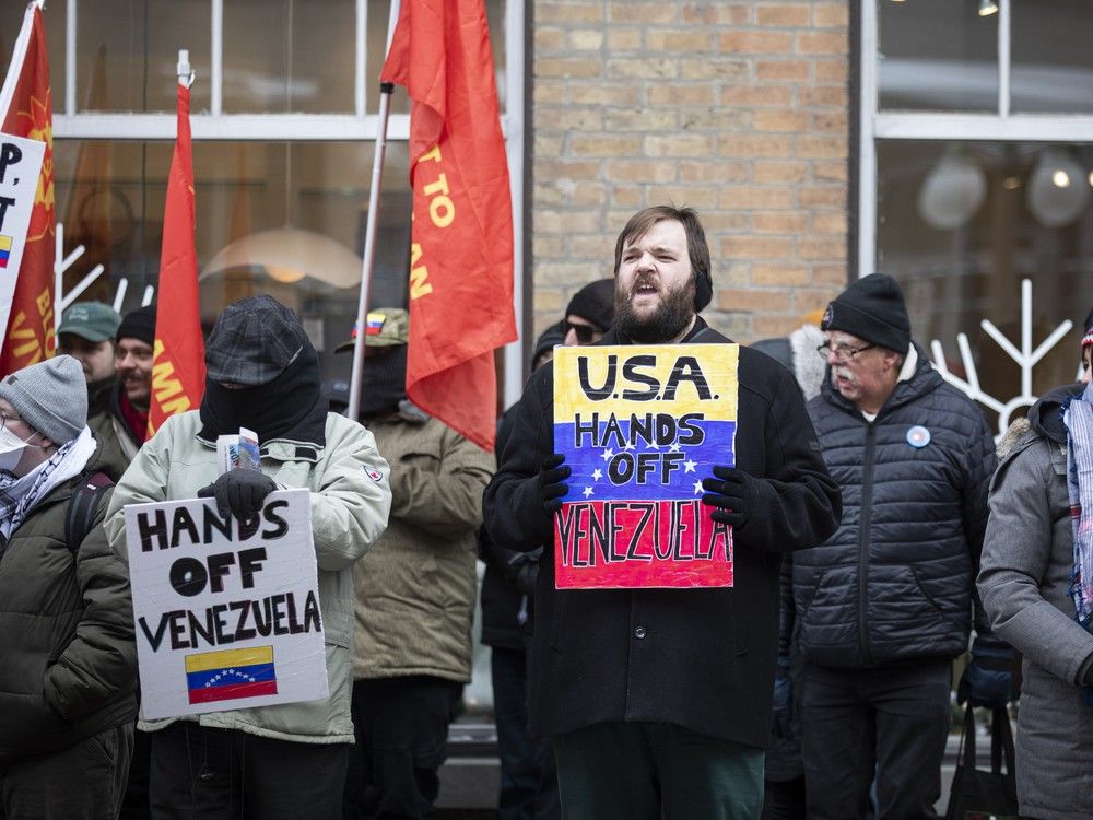 Protesters gathered and marched outside the U.S. Embassy in Ottawa on Sunday, Jan. 4, 2026, citing opposition to a reported U.S. incursion into Venezuela.
