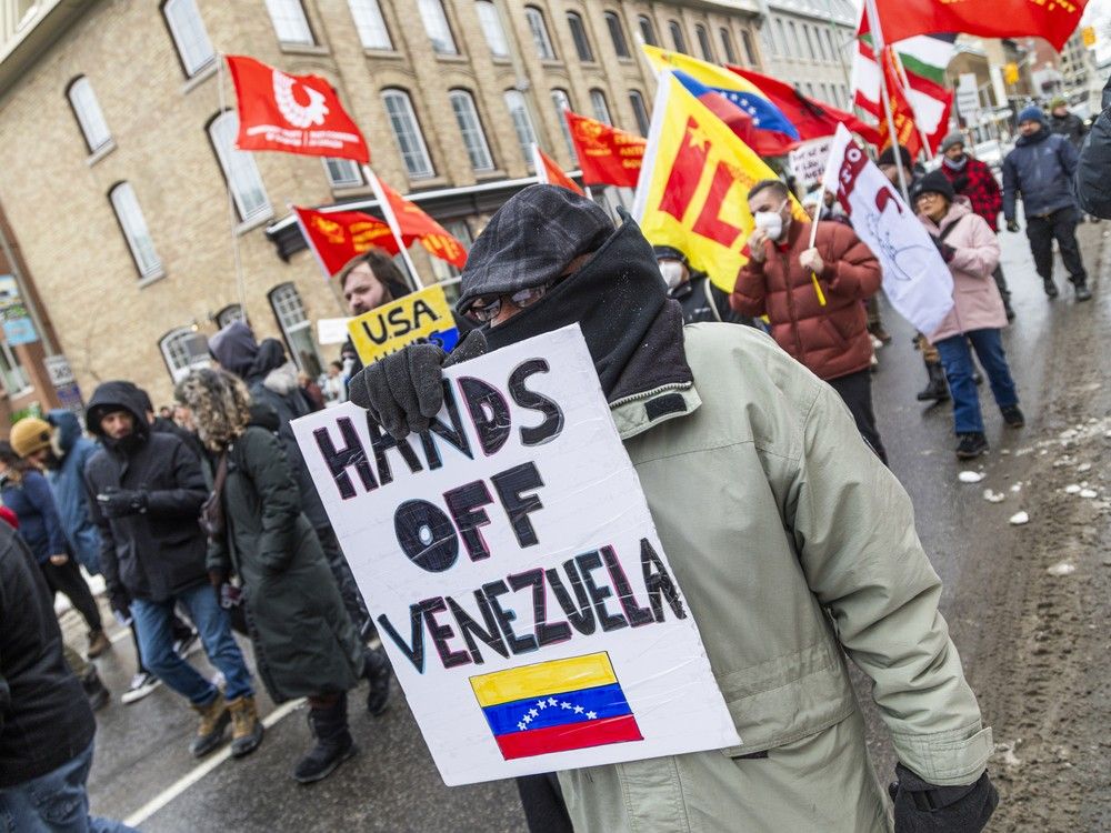 ‘Hands Off Venezuela’ protesters march in Ottawa following U.S. seizure of President Nicolás Maduro