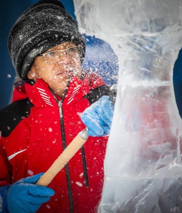  Ice carver Evher Coronel worked alongside his teammate on the Harmonic Mysticism sculpture at Winterlude in Confederation Park on Saturday.