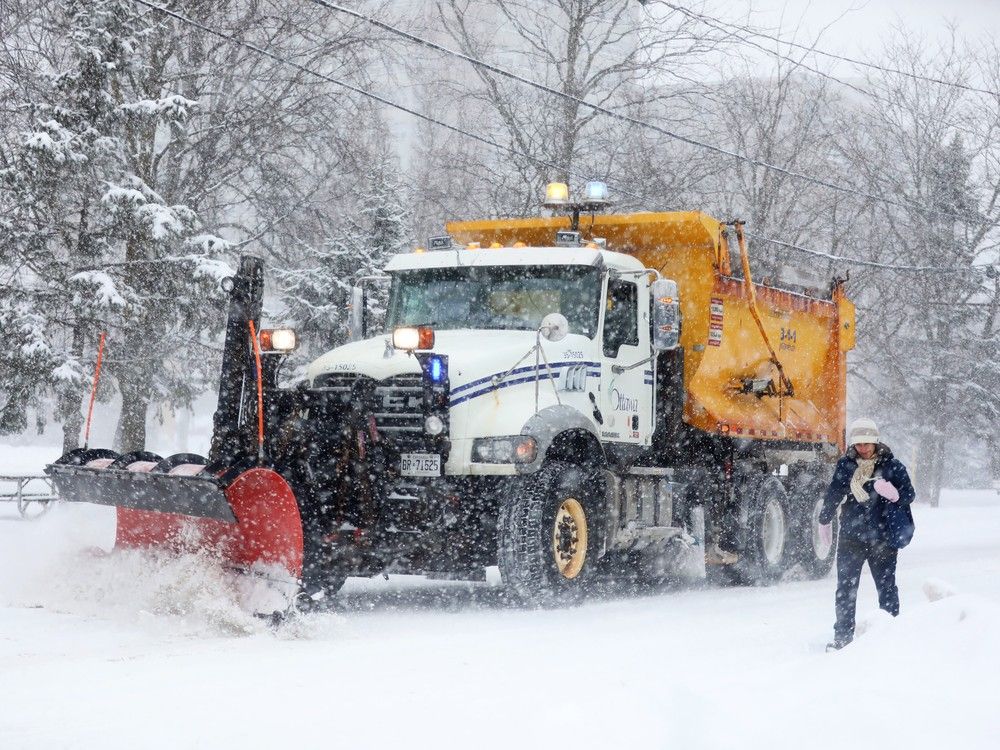  A snowplow clears the street as Ottawa was receiving a significant snow fall, January 15, 2026.