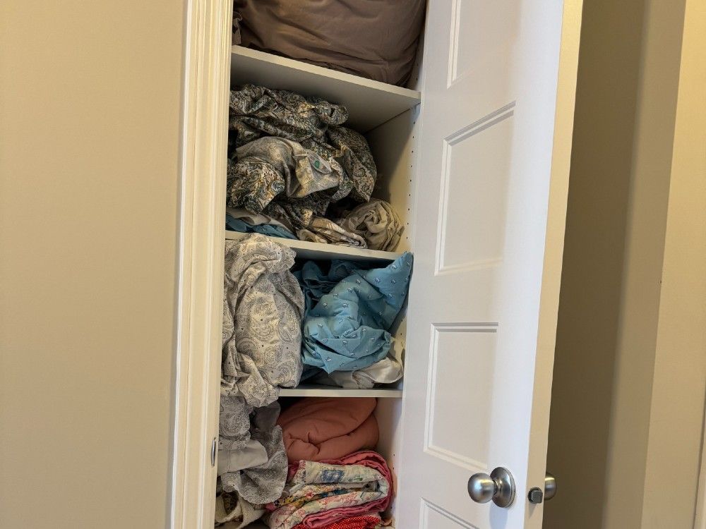Homeowner Organizes Linen Closet For Function