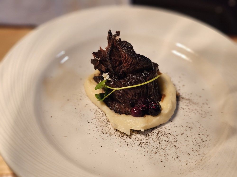  The Edmonton entry for the Canadian Culinary Championship 2026: Sych Homestead bison cheek with a black garlic glaze, Saskatoons, parsnip and smoked birch.