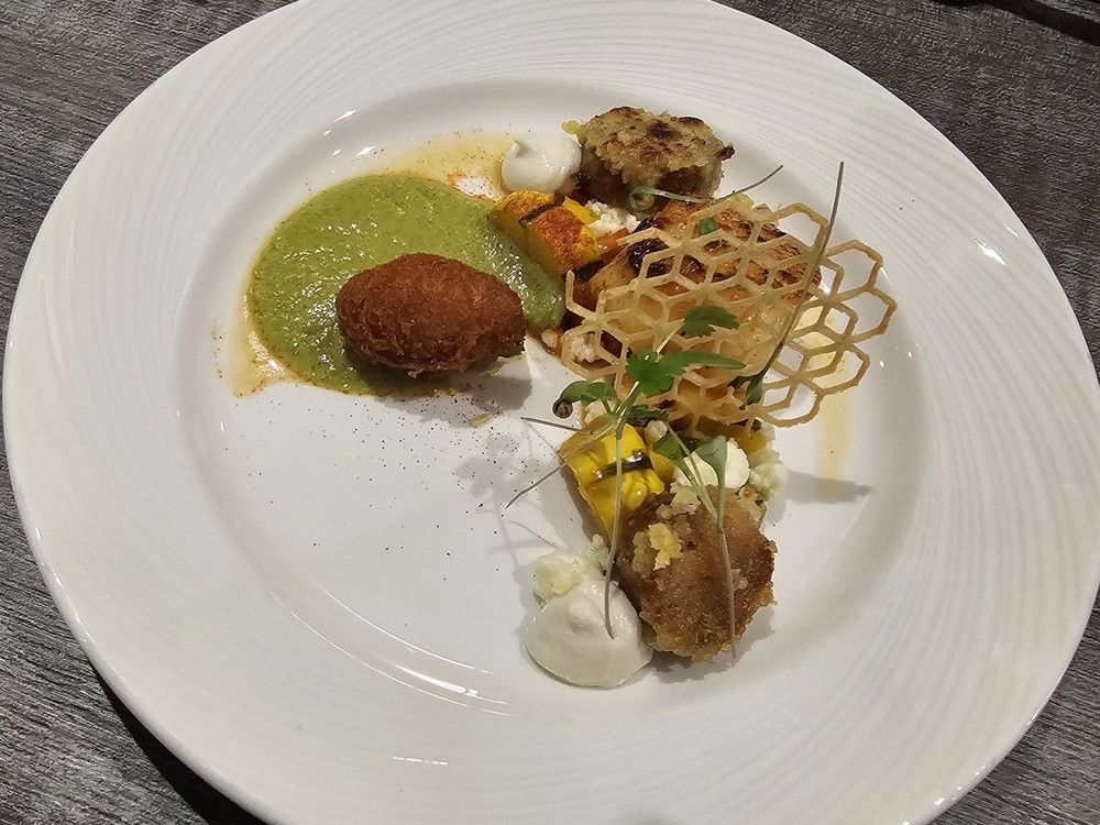  The Ottawa entry at the Canadian Culinary Championship 2026: Seared scallop with adobo, taro Aji Amarillo fritter, almond pudding, mango salsa, &lsquo;chorizo&rsquo; shrimp toast, poblano pepper sauce, tortilla tuile.