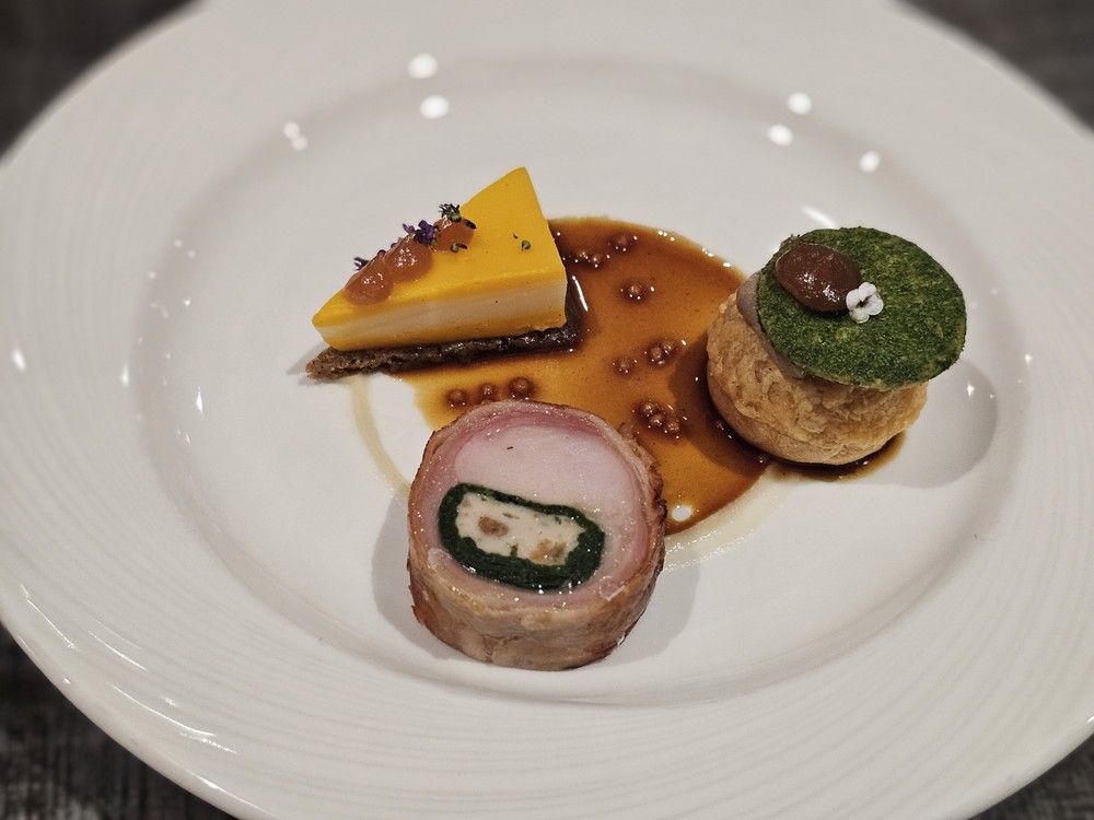  The Calgary dish at the Canadian Culinary Championship 2026: Mangalitsa belly wrapped rabbit loin stuffed with wild mushrooms and spinach, Grizzly gouda cheese, goug&egrave;re with rabbit p&acirc;t&eacute;, parsnip and squash bavarois, crabapple butter, rabbit and mustard jus.