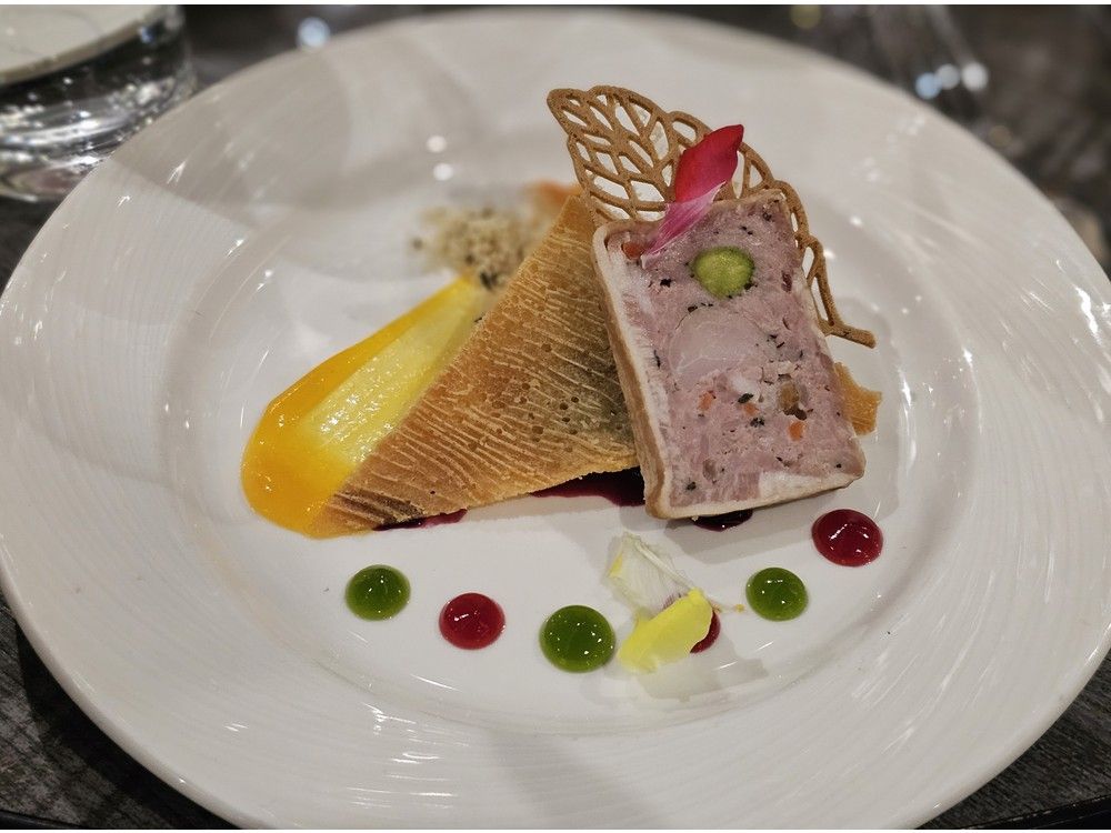  The St. John&rsquo;s dish at the Canadian Culinary Championship 2026: a plate of rabbit and pistachio terrine on top of Mt. Scio crumb and Newfoundland wildberry chutney.