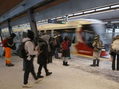 Passengers waiting for the LRT at Hurdman Station in Ottawa Wednesday. TONY CALDWELL, Postmedia.