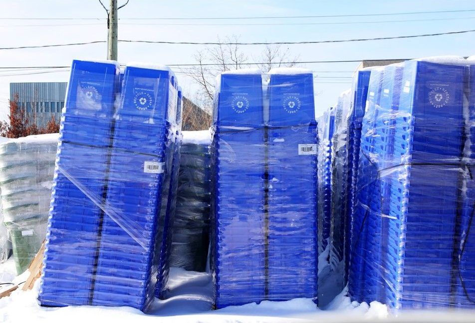  Blue recycling bins in storage outdoors at the Miller Waste facility at 1815 Bantree St. in Ottawa.
