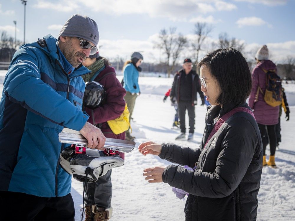 Reporter Paula Tran checks out her skates at her first try at speedskating during a free Winterlude event at Brewer Park Oval. Reporter Paula Tran checks out her skates at her first try at speedskating during a free Winterlude event at Brewer Park Oval.