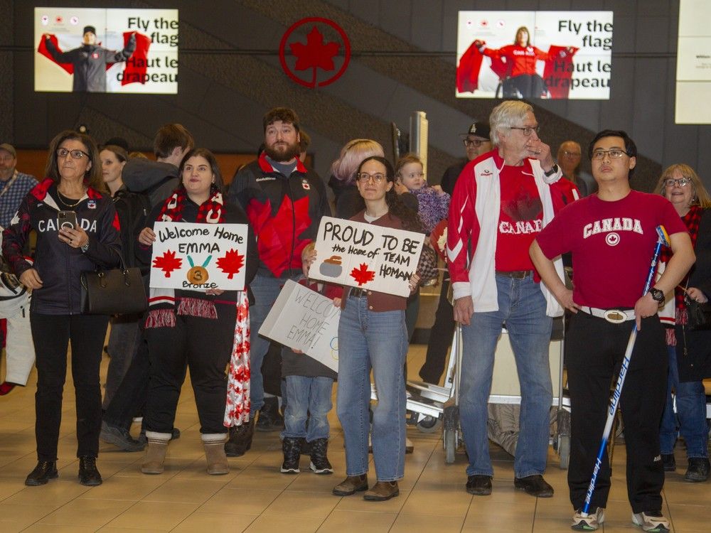 After a long travel day including some flight delays, these Olympians returned home to Ottawa, each with a medal around their necks.