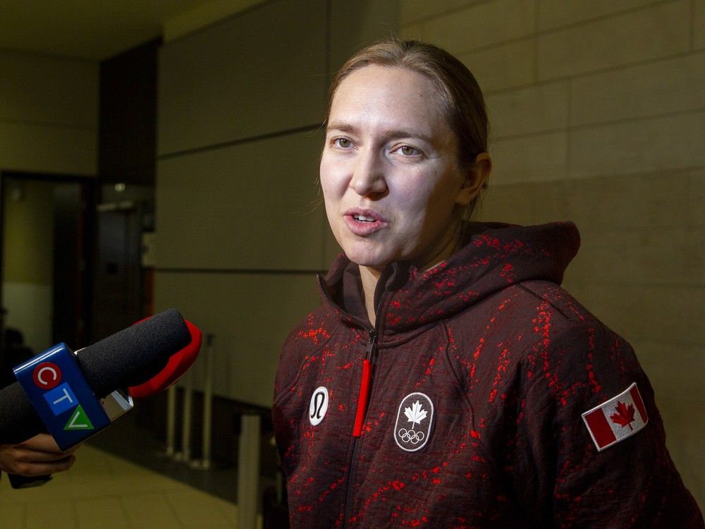  Ottawa Charge captain and Olympic silver-medallist Brianne Jenner speaks with media at the Ottawa International Airport Monday night.