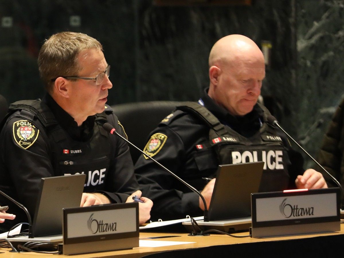  Ottawa Police Chief Eric Stubbs (left) and Deputy Chief Steve Bell during a meeting at city council in a file photo.