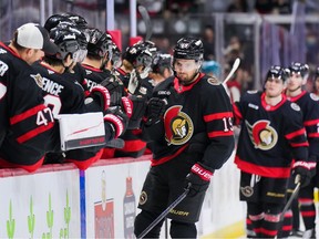 Drake Batherson of the Ottawa Senators celebrates his goal with teammates