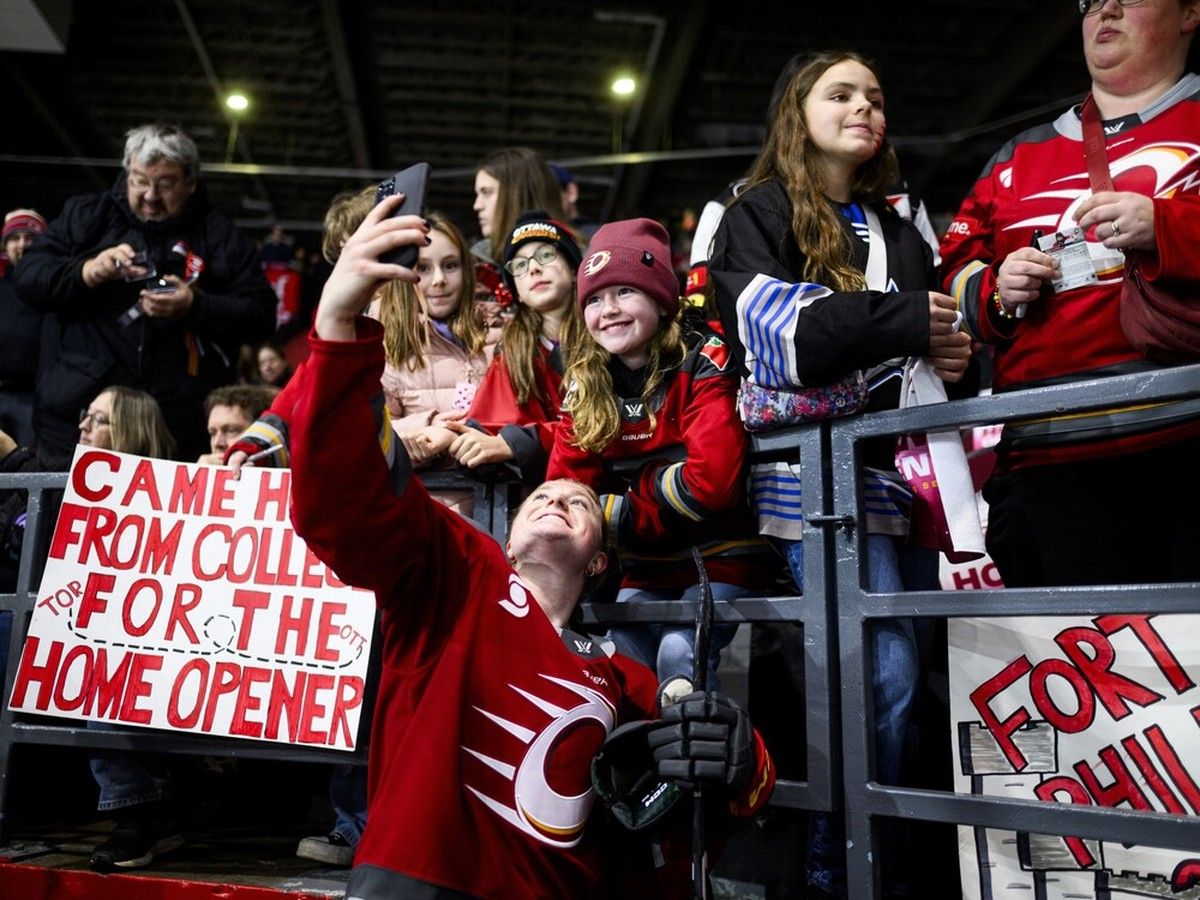  Charge centre Alexa Vasko takes a selfie with a fan before the PWHL team&rsquo;s first game of the 2025-26 season against the New York Sirens on Saturday, Nov. 22, 2025.