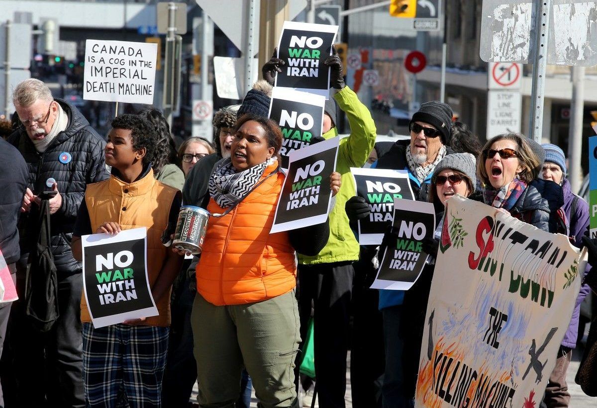 Dozens of protesters gathered outside the Château Laurier in downtown Ottawa on March 4. by JULIE OLIVER/Postmedia Dozens of protesters gathered outside the Château Laurier in downtown Ottawa on March 4. by JULIE OLIVER/Postmedia