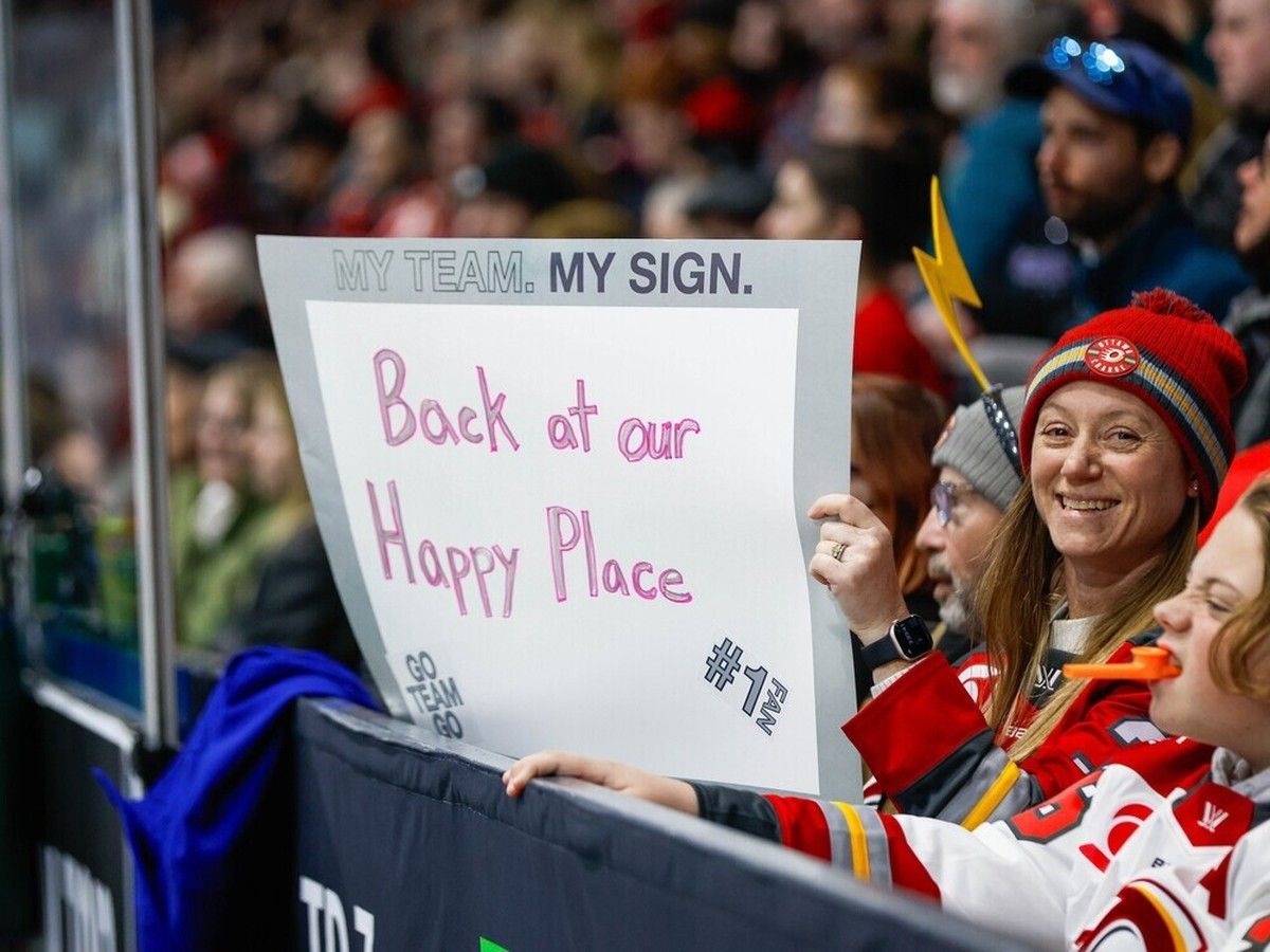  A happy Ottawa Charge fan brandishes a sign at the PWHL team&rsquo;s home game against the Boston Fleet on Feb. 28, 2026. Boston won the game 3-2 in a shootout.