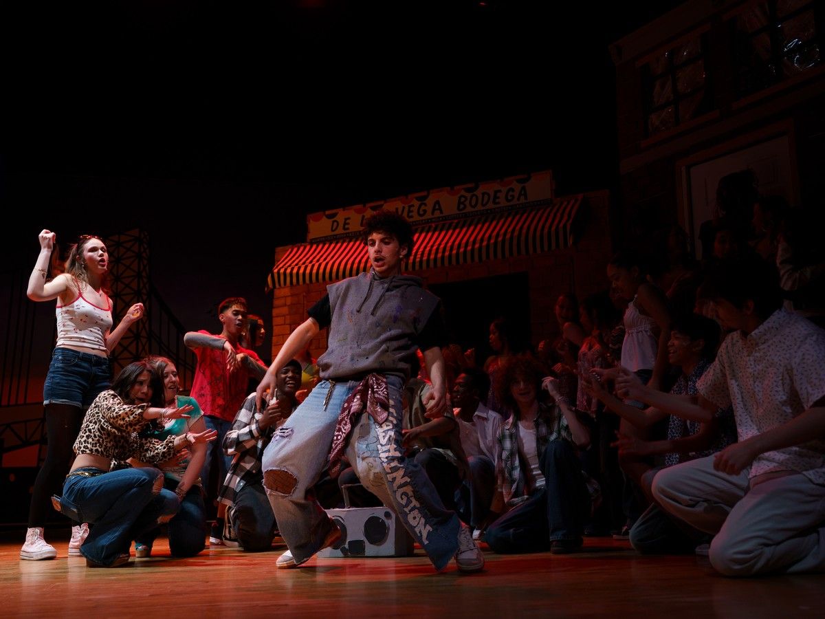 Omar Shabana as Graffiti Pete (C) and the cast of In the Heights during St. Patrick's High School's Cappies production of In the Heights, on April 10, 2026
