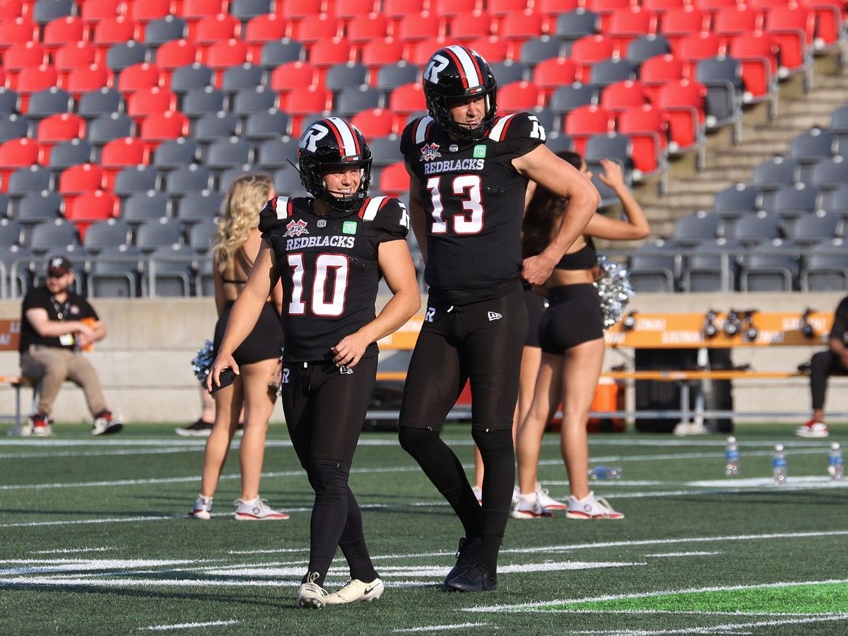  Kicker Lewis Ward (10) and holder/punter Richie Leone (13).