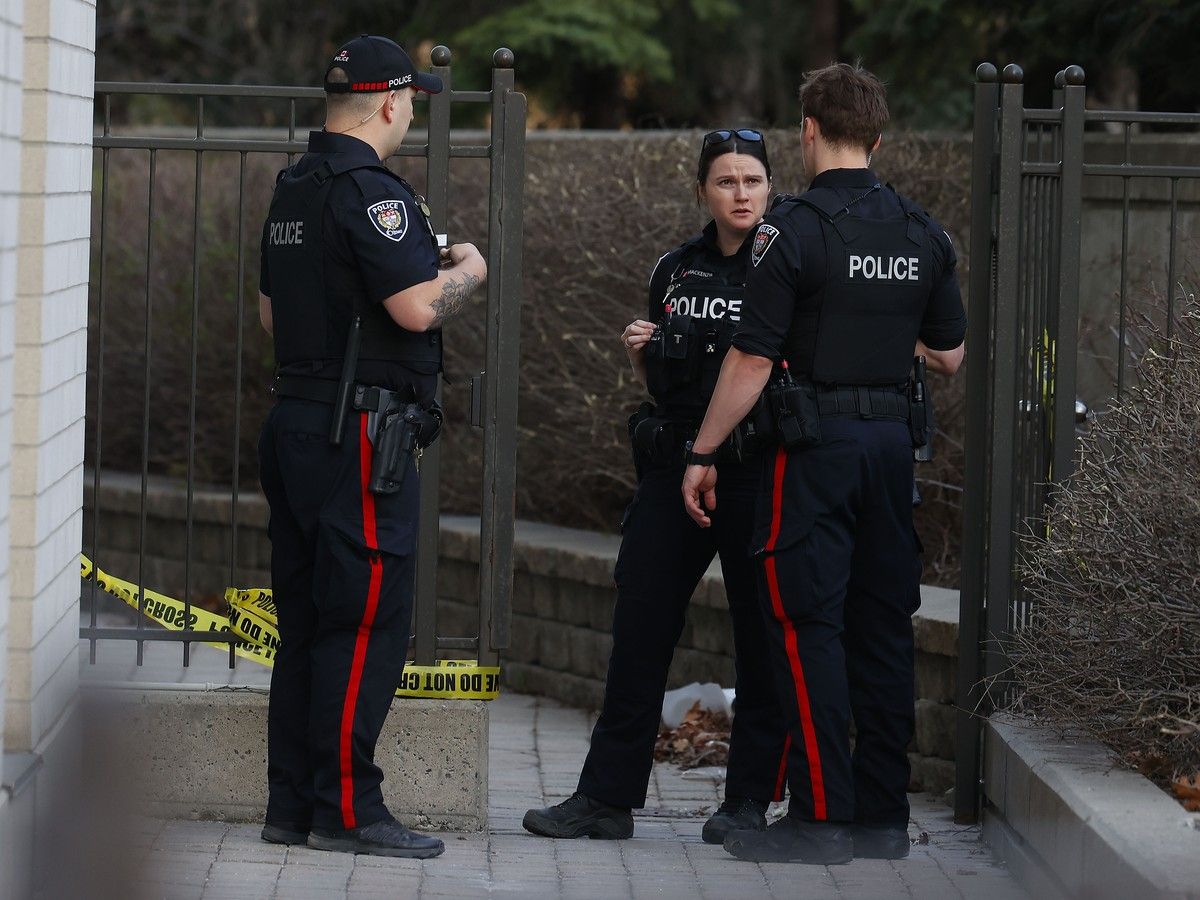  Ottawa police and paramedics were at the scene of 50 Laurier Ave. E on Monday evening. Police had the rear west side of the building taped off.