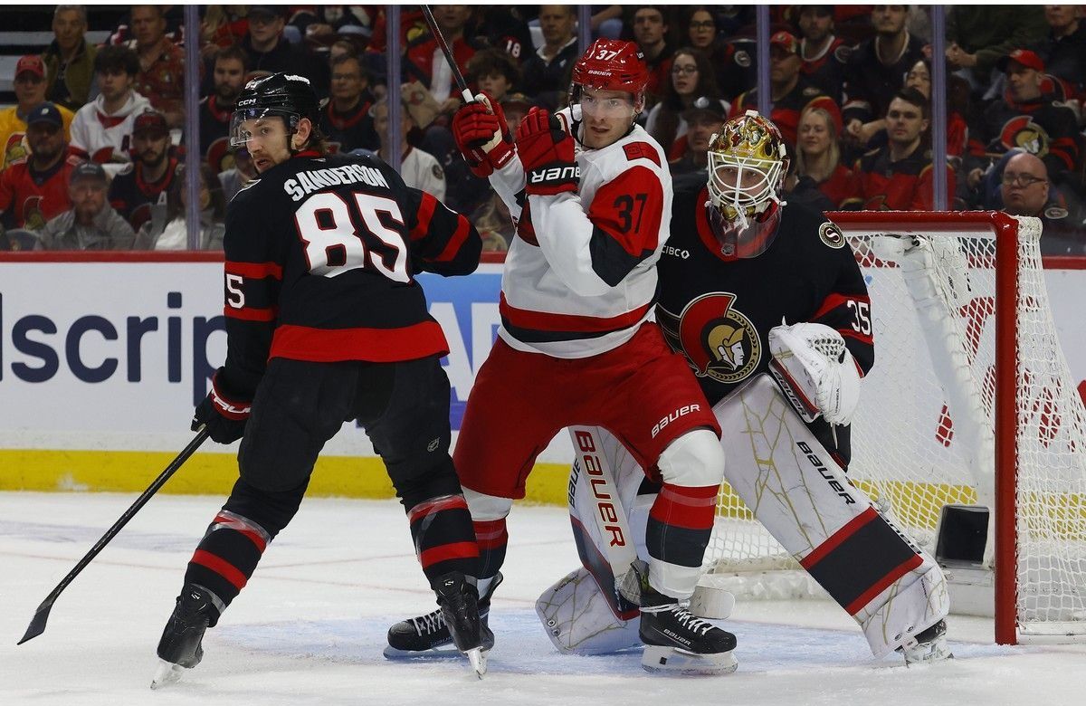 Jake Sanderson defending