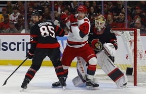 Jake Sanderson defending