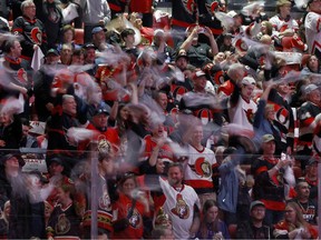 Enthusiastic Ottawa Senator fans are seen at the Canadian Tire Centre during the 2025 playoffs.