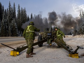 Soldiers from 1st Regiment, Royal Canadian Horse Artillery fire a howitzer during Operation PALACI avalanche control at Rogers Pass, British Columbia on 22 November 2019.