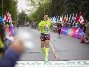 Olivier Querry finishing the marathon Sunday morning.