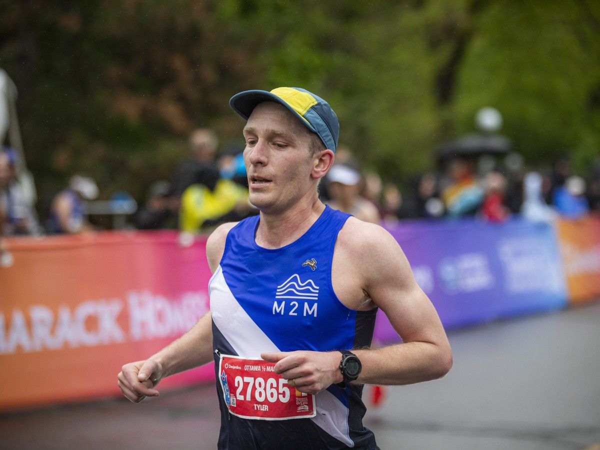  Tyler Hamilton of Toronto was the second person to finish the half marathon Sunday morning.