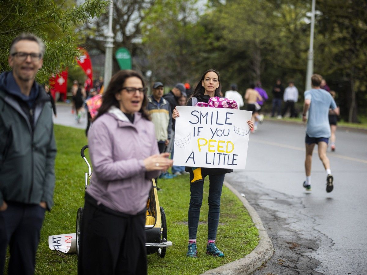 Countless cheer signs were spotted along the route, bringing smiles to runners Sunday morning.