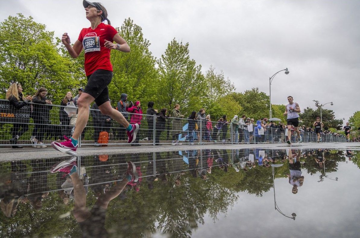  Sarah-Dawn Norris runs to the finish of the marathon Sunday morning.