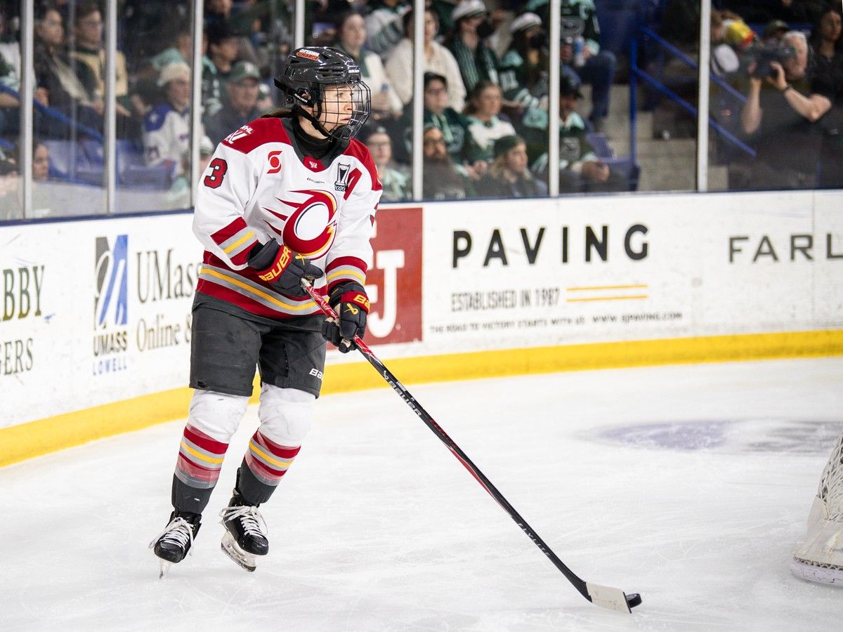 Jocelyne Larocque in a white jersey.