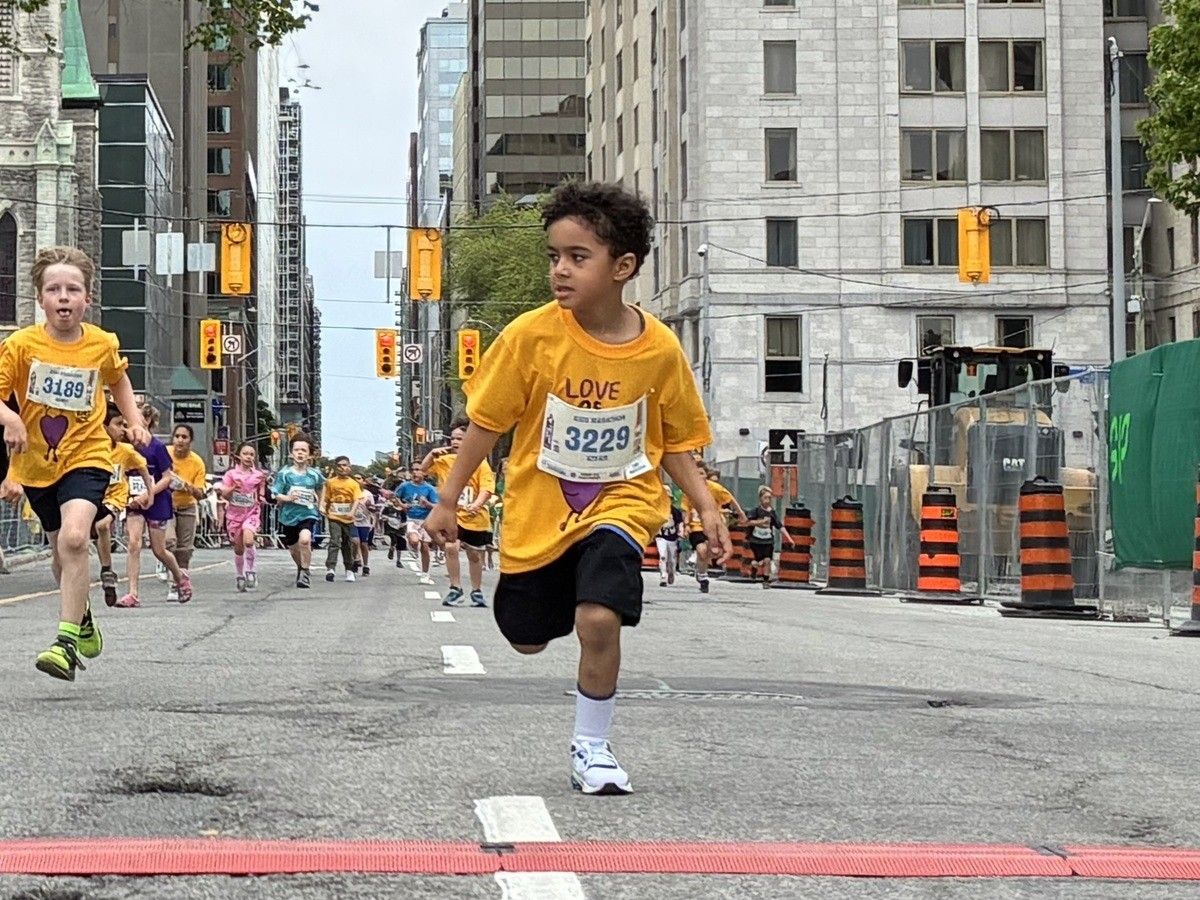 Kiyan Gavrish (3229) reaches the finish line ahead of James Johnston (3189, left) in the Ottawa Kids’ Marathon, part of Tamarack Ottawa Race Weekend, on Saturday. Kiyan Gavrish (3229) reaches the finish line ahead of James Johnston (3189, left) in the Ottawa Kids’ Marathon, part of Tamarack Ottawa Race Weekend, on Saturday.