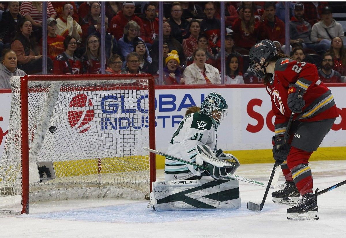 Ottawa Charge player Sarah Wozniewicz watches Fanuza Kadirova's goal go in