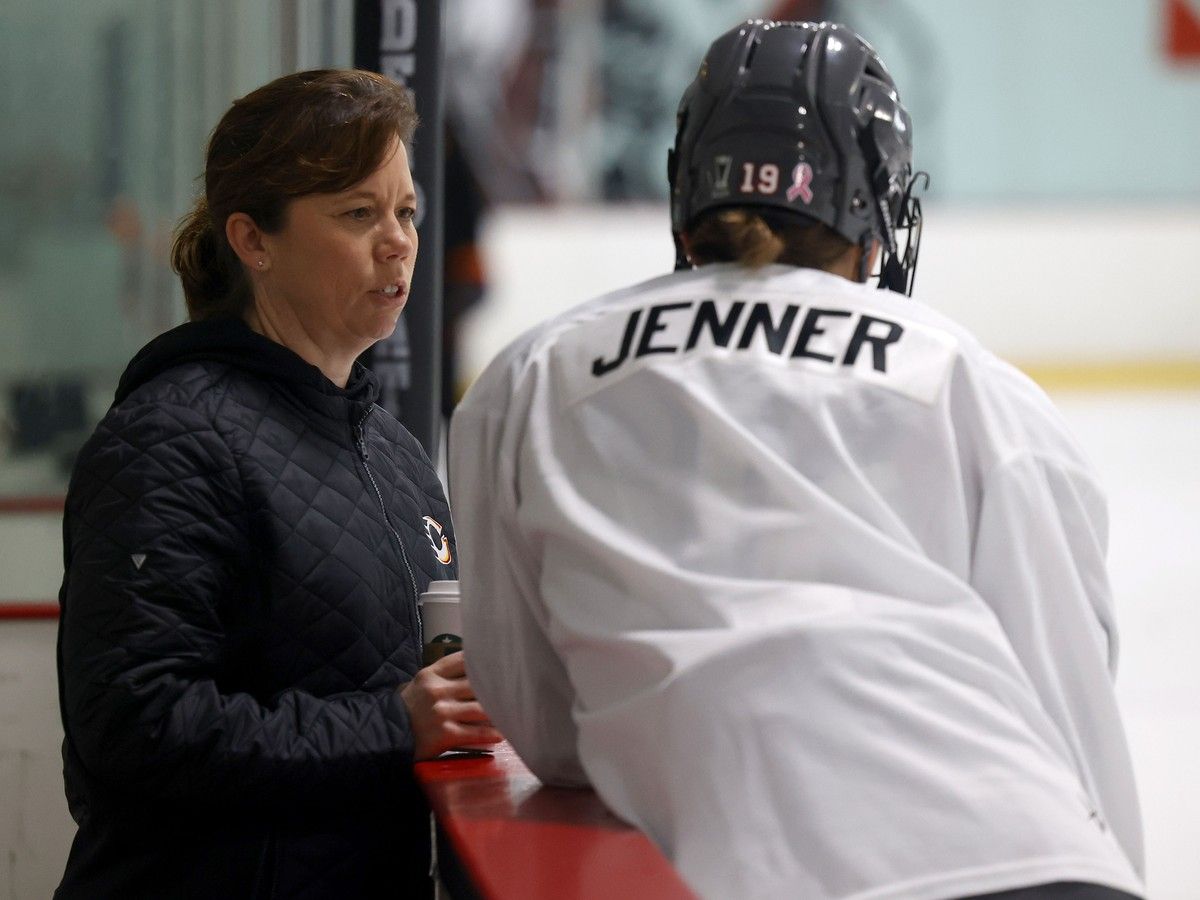 Ottawa Charge head coach Carla MacLeod talks to Brianne Jenner during practice at the Bell Sensplex