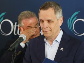Rick Leary, general manager of OC Transpo (left) and Ottawa Mayor Mark Sutcliffe speak to the media Tuesday. TONY CALDWELL, Postmedia.