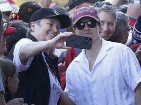 The Ottawa Charge's Michela Cava poses for photos with fans Monday.