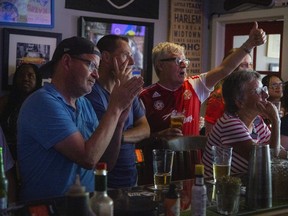 Canadian supporters gathered at Pubblico Eatery to cheer on Canada's men's national soccer team during its FIFA World Cup match against South Africa.