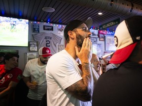 Canadian supporters, including Taylor Fantin, filled Pubblico Eatery to cheer on Canada's men's national soccer team during its FIFA World Cup match against South Africa