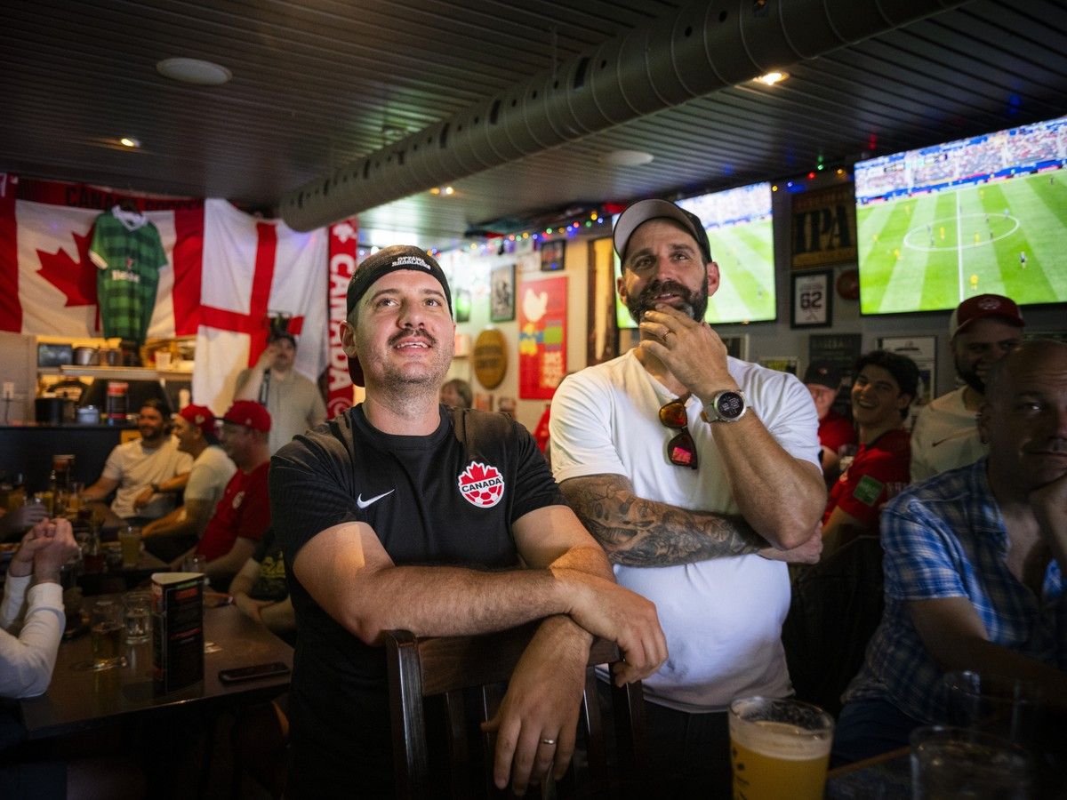 Canadian supporters, including Jason Meehan and Taylor Fantin, gathered at Pubblico Eatery to cheer on Canada's men's national soccer team during its FIFA World Cup match against South Africa, Sunday, June 28, 2026.