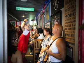 Canadian supporters gathered at Pubblico Eatery to cheer on Canada's men's national soccer team during its FIFA World Cup match against South Africa.