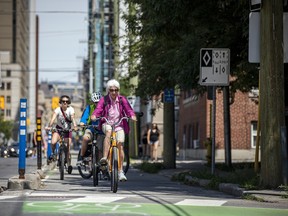 Cyclists on O'Connor Street, Saturday, July 8, 2023.