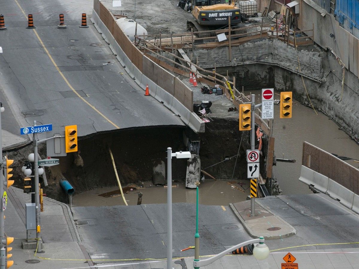 A large portion of Rideau Street in downtown Ottawa caved in, causing a massive sinkhole that knocked out power to the majority of the downtown area on June 8, 2016. The massive sinkhole formed next to a shopping mall in downtown Ottawa, caused a gas leak and forced the evacuation of all nearby businesses. A large portion of Rideau Street in downtown Ottawa caved in, causing a massive sinkhole that knocked out power to the majority of the downtown area on June 8, 2016. The massive sinkhole formed next to a shopping mall in downtown Ottawa, caused a gas leak and forced the evacuation of all nearby businesses.