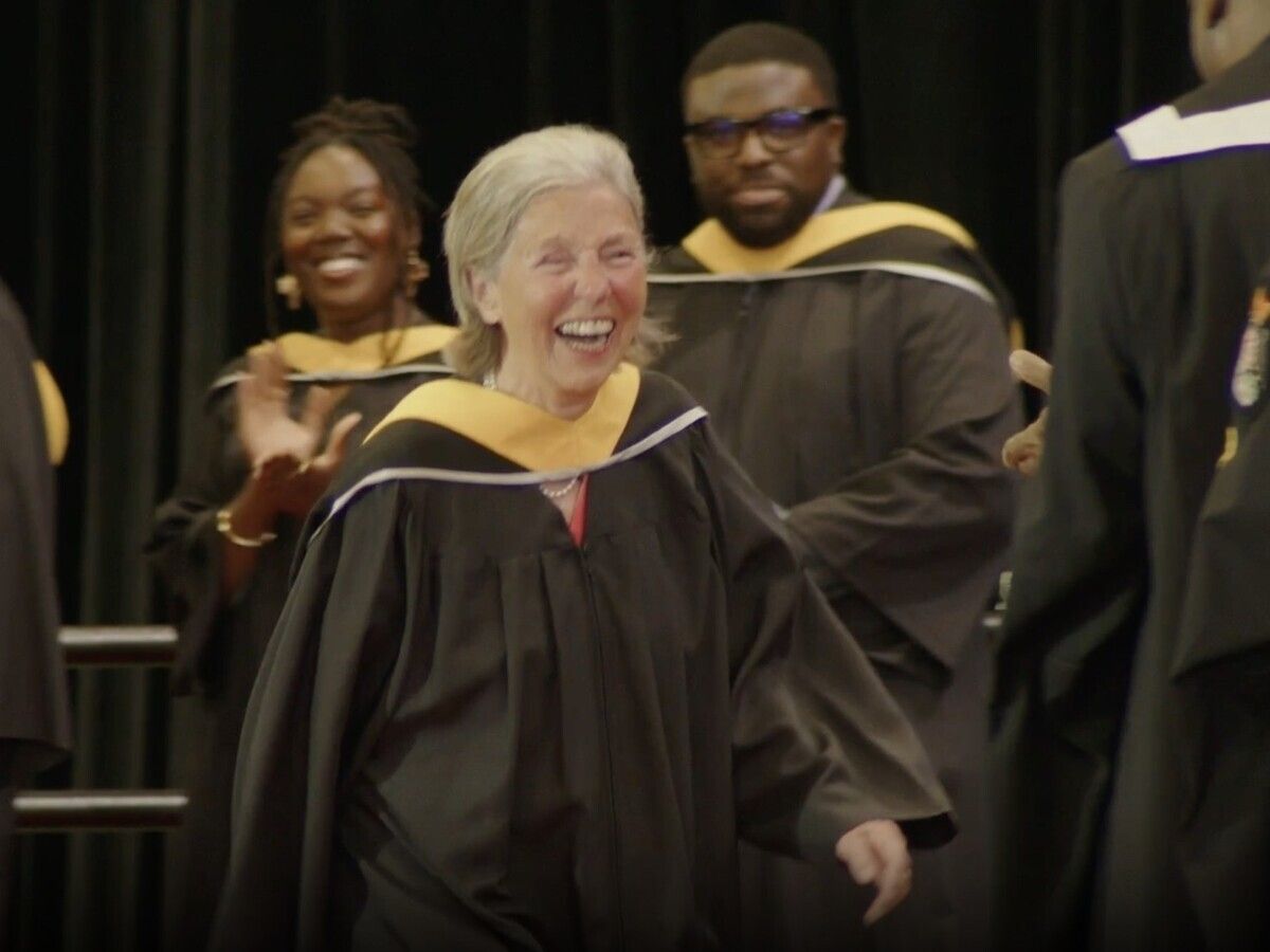  Ann Laubstein strides onto the stage to receive her Bachelor of Science degree in Neuroscience and Mental Health at a Carleton University convocation ceremony on June 11.