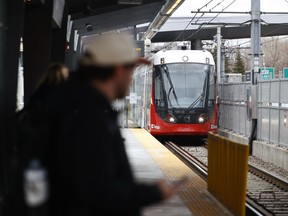 An OC Transpo LRT in a recent file photo. The transit service will offer two free weekends later this year after several months of poor service.