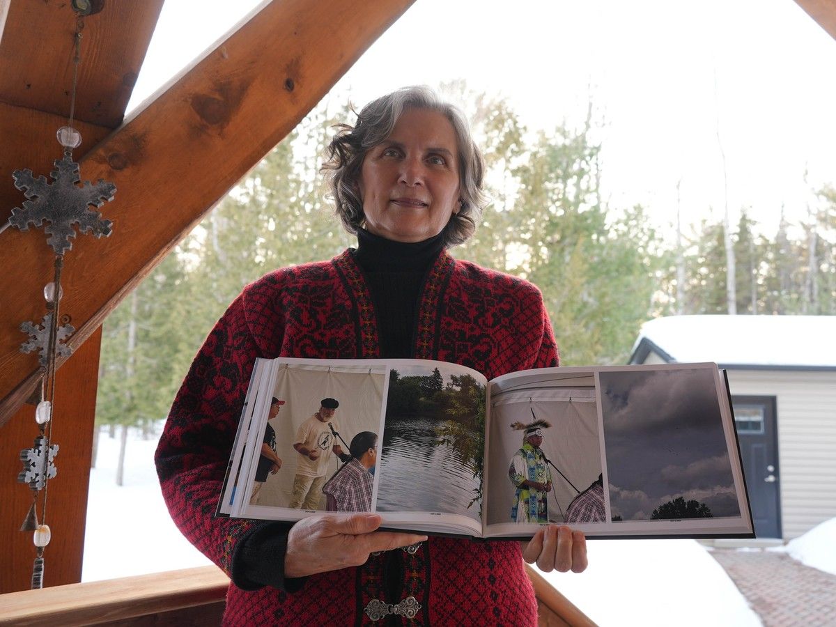 Following losses in her family, being on the river was a healing experience, Wendy Jocko says. Here she shows photos of the 2025 Pinesi Paddle at her home in Pikwakanagan. Following losses in her family, being on the river was a healing experience, Wendy Jocko says. Here she shows photos of the 2025 Pinesi Paddle at her home in Pikwakanagan.